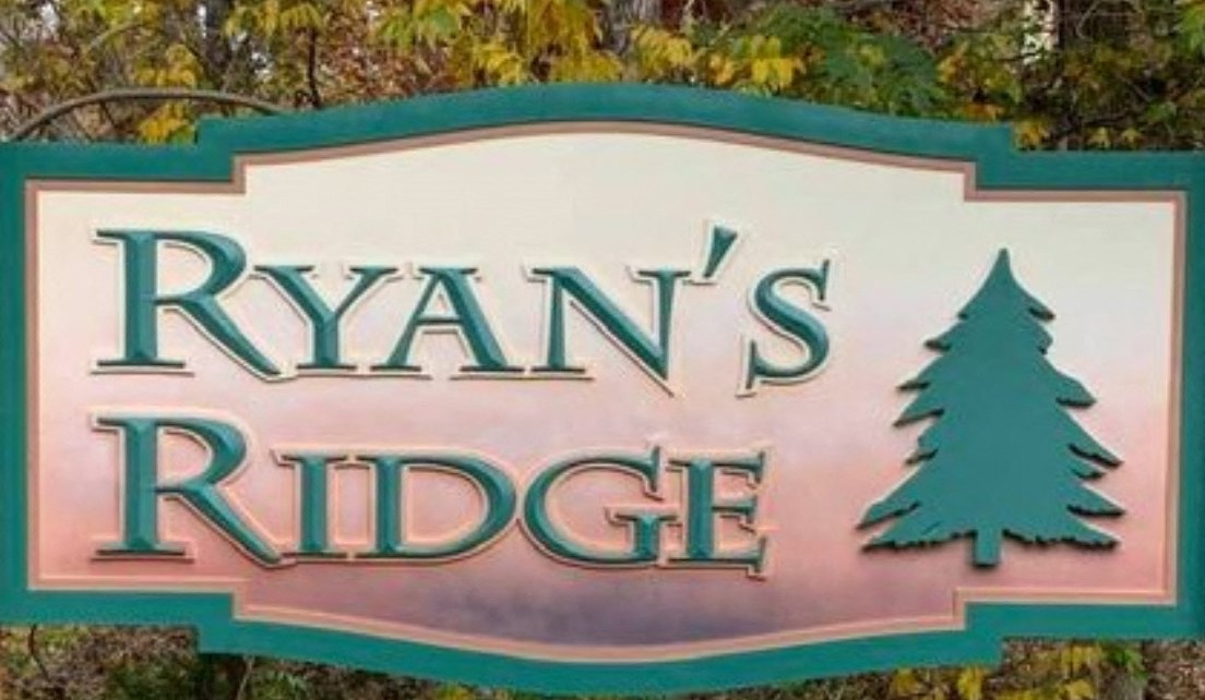 Ryans Ridge Condominium Association logo
